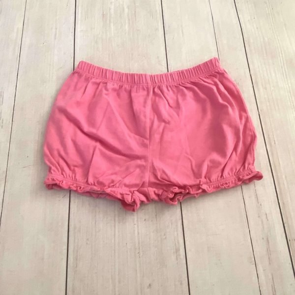 Short fucsia con voladitos CARTERS